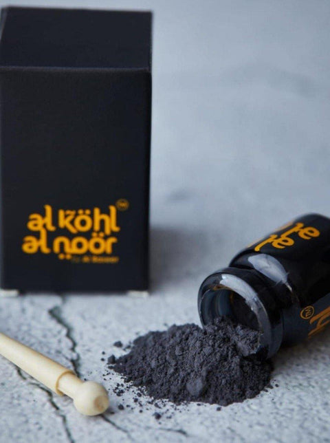 Al-Kohl Al-Noor Ithmid Kohl bottle with traditional wooden mirwad applicator